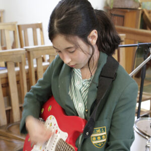Prep Music Showcase - pupil playing guitar