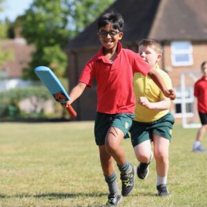 Prep pupils playing cricket