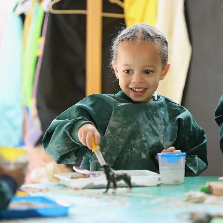 Early Years pupil playing