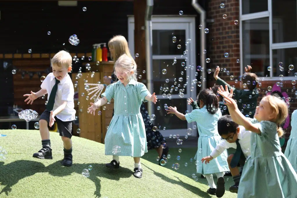 Early Years playing outside