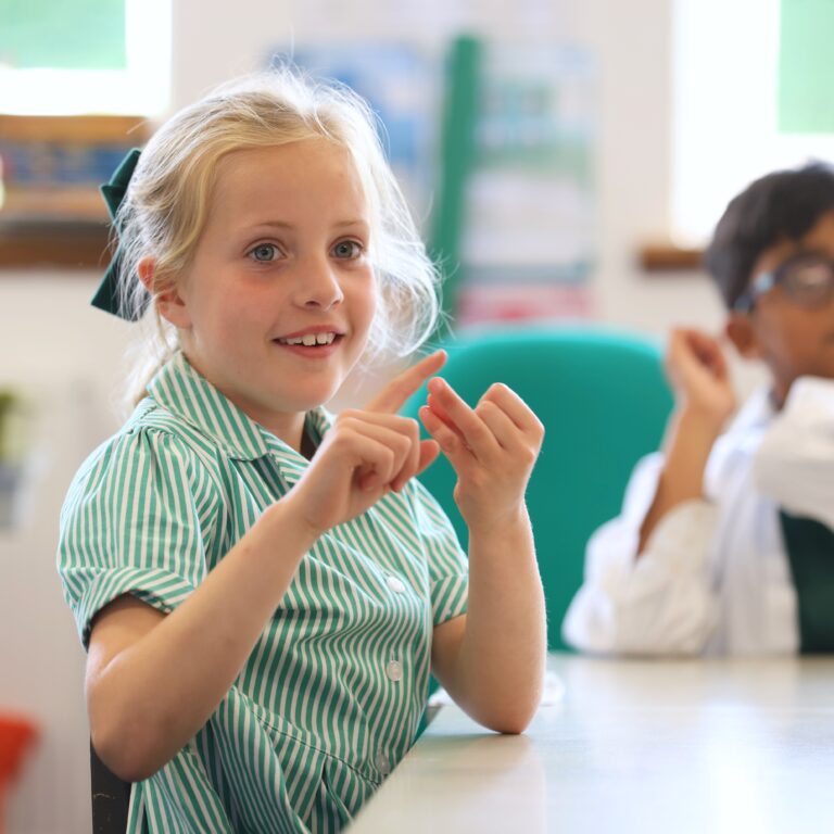 Prep pupil learning British Sign Language