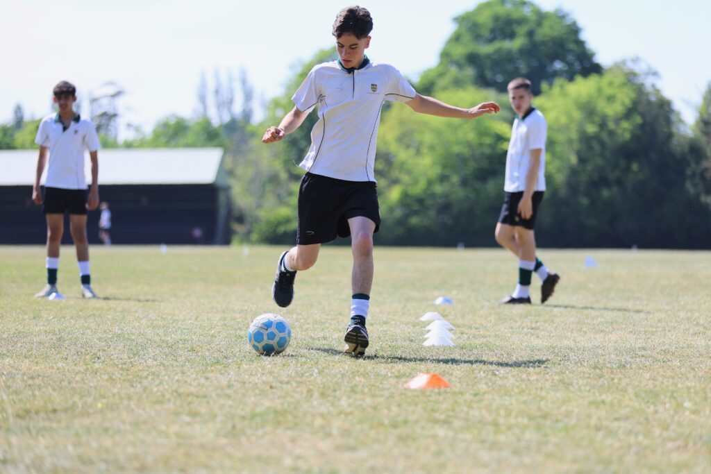 Senior School pupils playing football