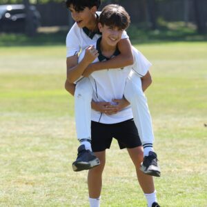 Senior School pupils playing cricket