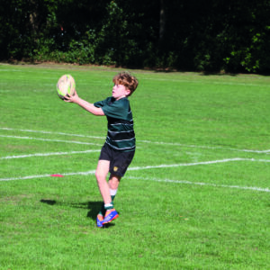 Prep School pupil playing rugby