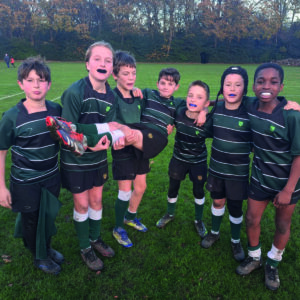 Year 6 pupils playing Rugby