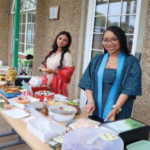 Pupils serving food at Culture Carnival Day