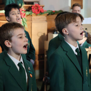 Pupils Singing At The Key Stage 2 Carol Service