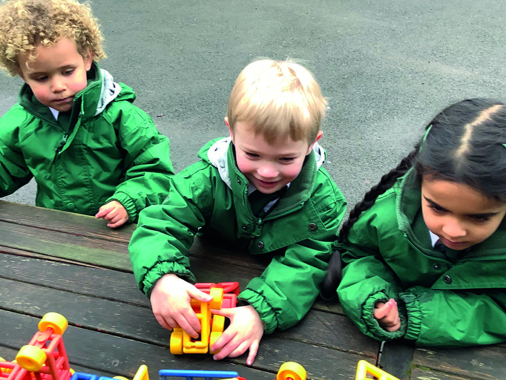 Early Years pupils playing