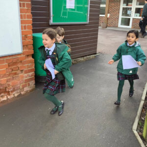 Year 1 pupils on a treasure hunt