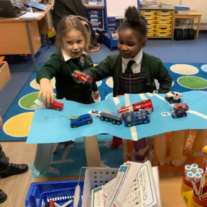Year 1 pupils testing bridges