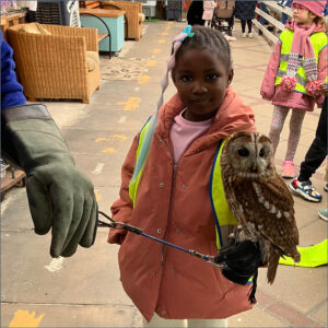 Prep School pupil holding an owl