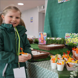 Prep School pupil eating vegetables