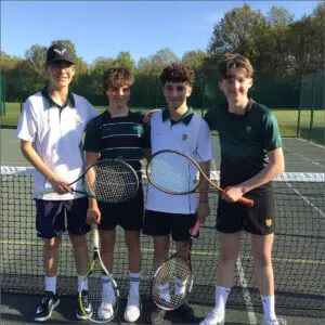 Pupils with tennis rackets