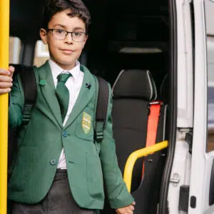 Prep School pupil getting the mini bus